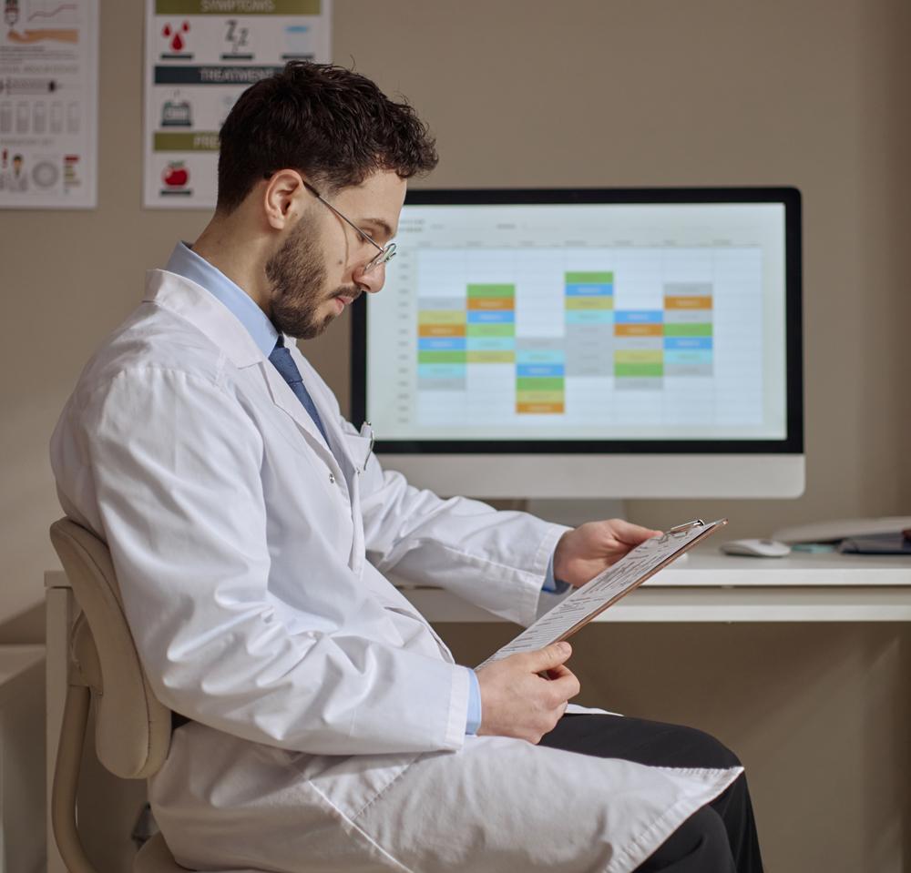 Man looking at schedule